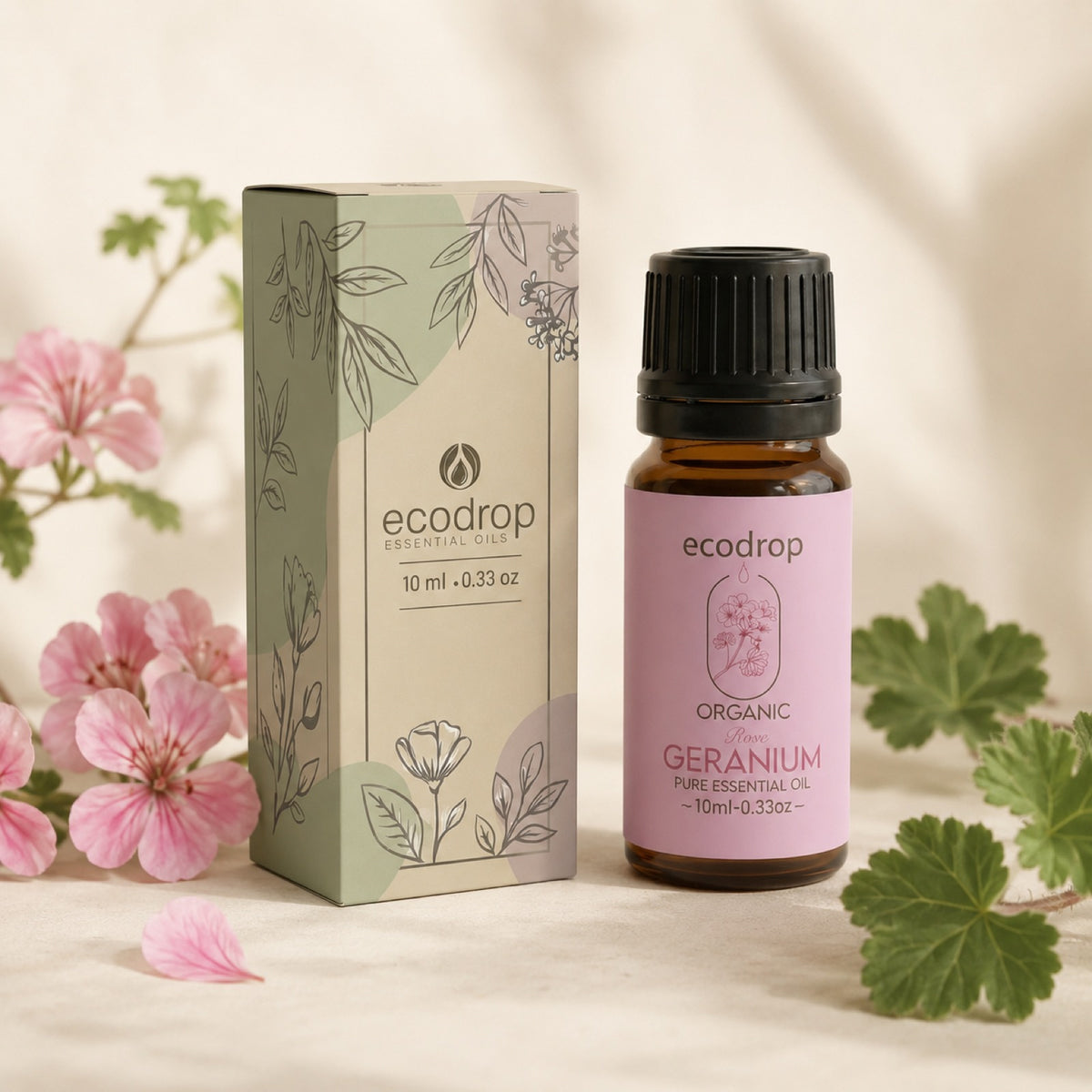 Organic Rose Geranium essential oil with box packaging and geranium flowers