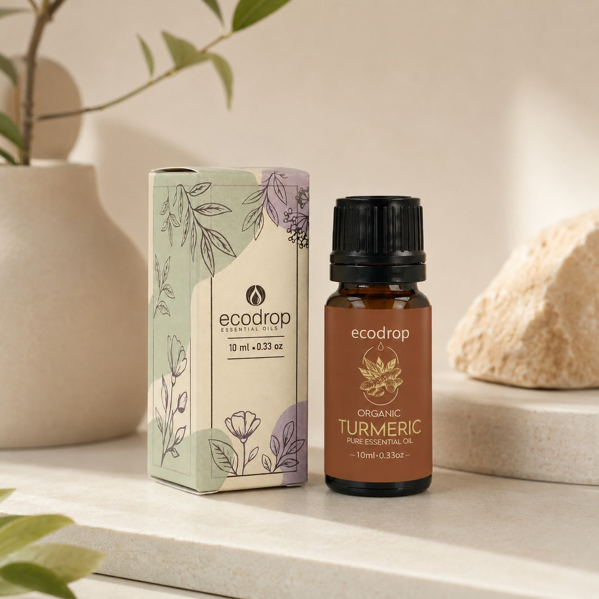 Organic Turmeric Essential Oil bottle with botanical box