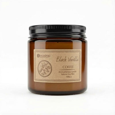 Vanilla & Coffee soy candle, 100g, in an amber glass jar with a black lid on a white background