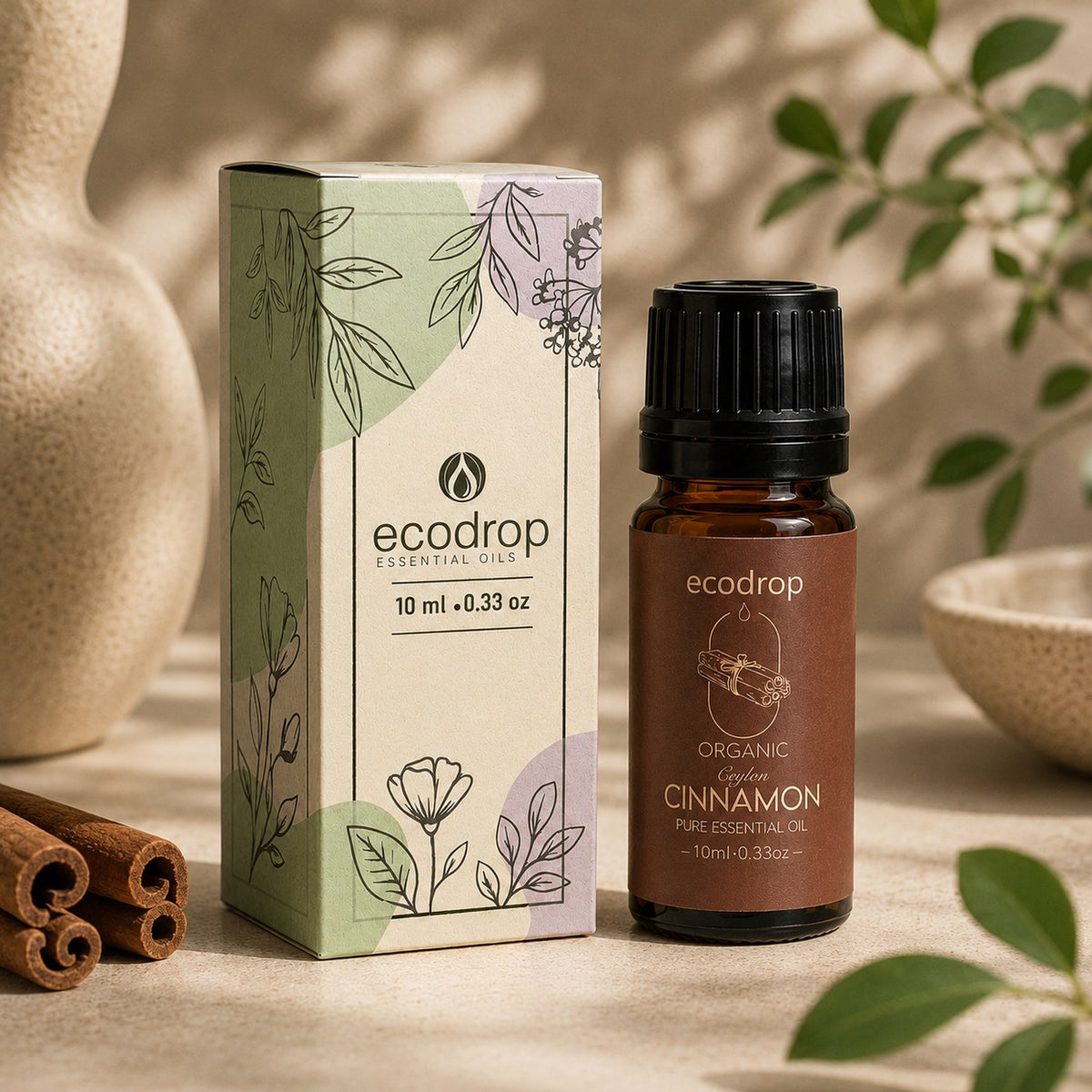 Ceylon cinnamon bark oil 10ml bottle with its Ecodrop box and cinnamon quills
