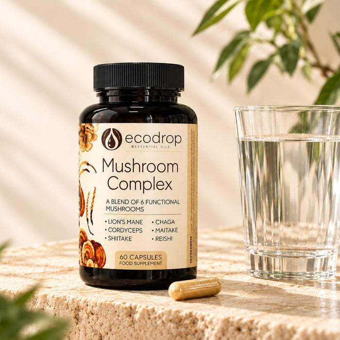 Mushroom Complex bottle with a capsule and a glass of water