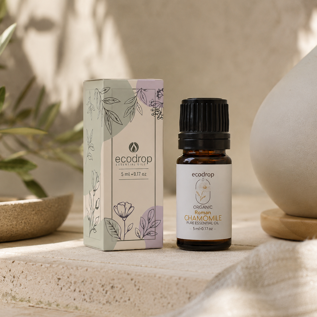 Roman chamomile essential oil 5ml bottle beside its Ecodrop gift box