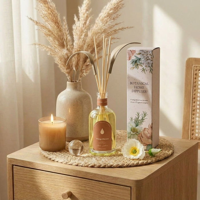 Orange Blossom reed diffuser styled on a bedside table