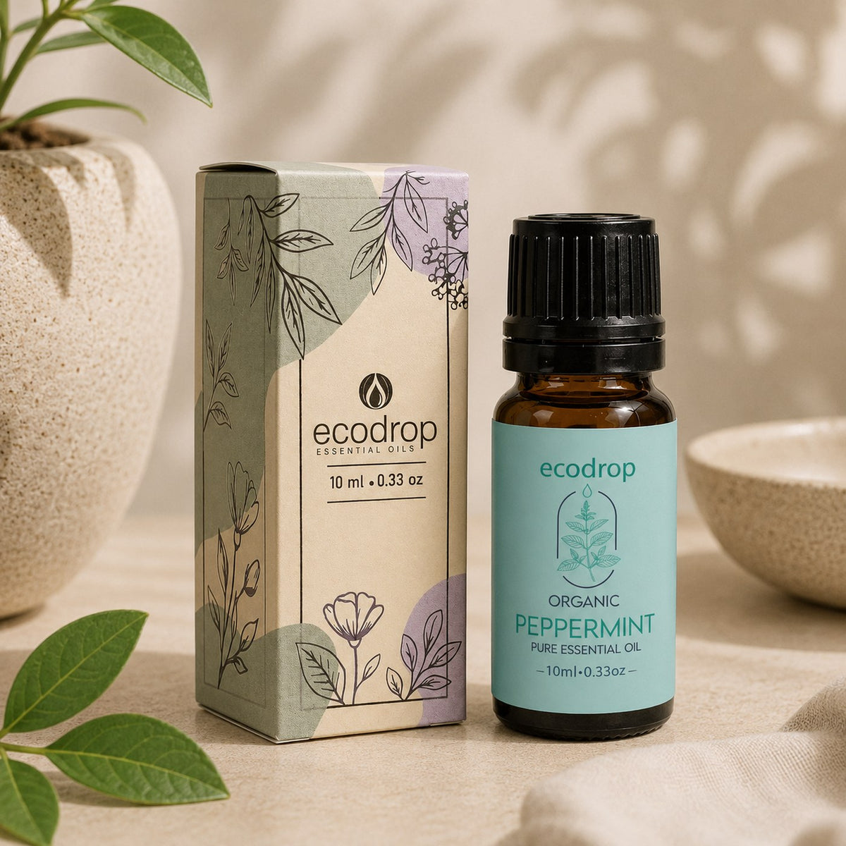 Organic peppermint essential oil 10ml bottle with Ecodrop carton and fresh mint