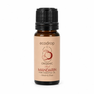 Organic red mandarin essential oil 10ml amber bottle on a white background