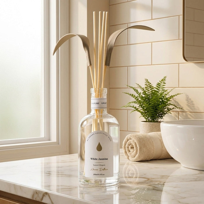 White Jasmine reed diffuser styled on a bathroom vanity